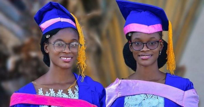 Adorable twins bag first-class degrees from the same university