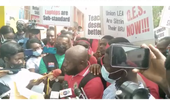 Teachers demo against laptop