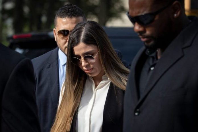 NEW YORK, NY - JULY 17: Emma Coronel Aispuro, wife of Joaquin "El Chapo" Guzman, is surrounded by security as she arrives at federal court on July 17, 2019 in New York City. El Chapo was found guilty on all charges in a drug conspiracy trial and will be sentenced this morning. (Photo by Drew Angerer/Getty Images)