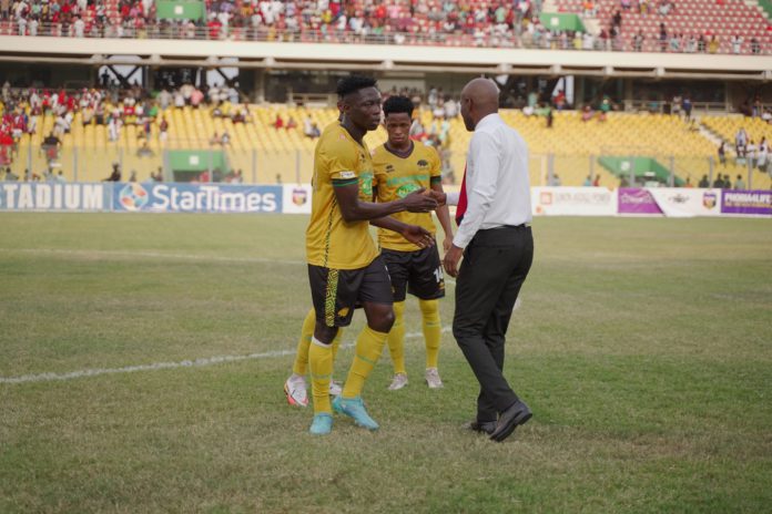 Kotoko coach congratulating players after Hearts of Oak game Kotoko coach congratulating players after Hearts of Oak game