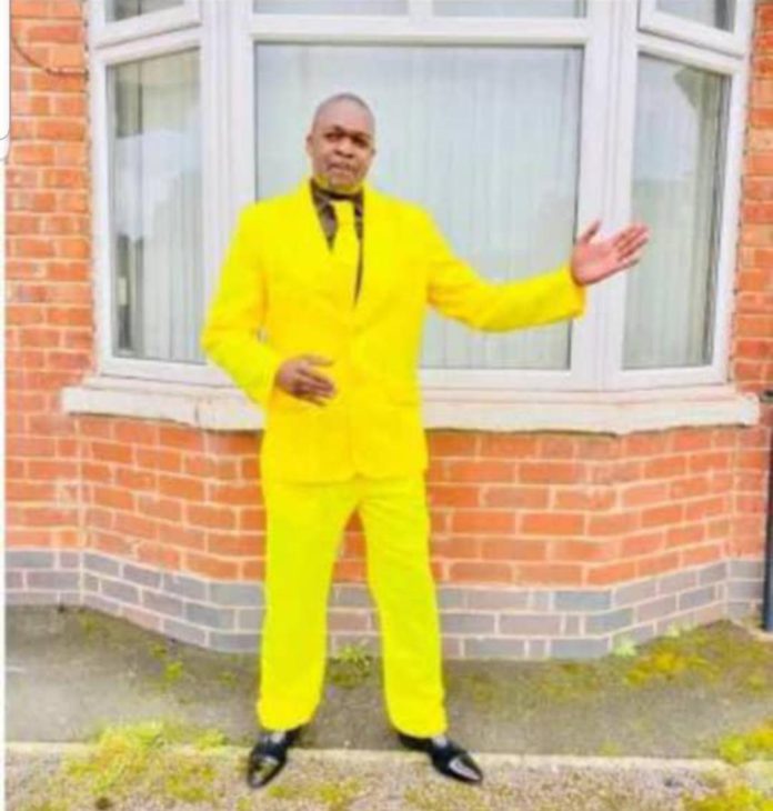 Politician expelled from ruling party for wearing yellow suit