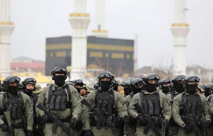 Russian service members gather during head of the Chechen Republic Ramzan Kadyrov's address, dedicated to a military conflict in Ukraine ( Image: REUTERS) Russian service members gather during head of the Chechen Republic Ramzan Kadyrov's address, dedicated to a military conflict in Ukraine ( Image: REUTERS)