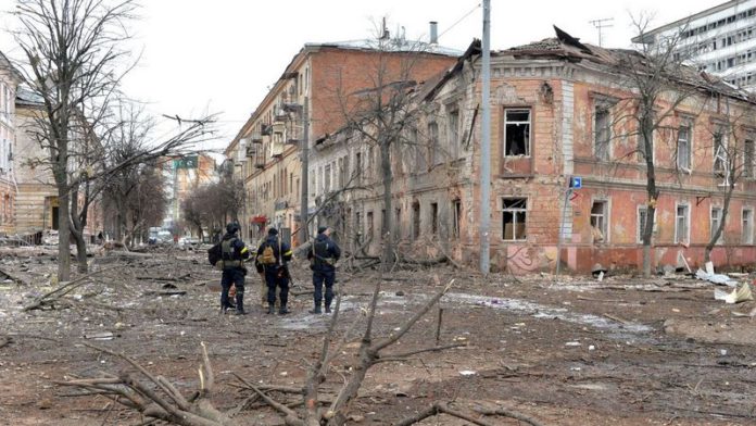 Ukrainian police officers patrol a street following shelling in Ukraine's second-biggest city of Kharkiv (Image: AFP via Getty Images) Ukrainian police officers patrol a street following shelling in Ukraine's second-biggest city of Kharkiv (Image: AFP via Getty Images)