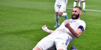 Karim Benzama of Real Madrid reacts after scoring during the UEFA Champions League Round Of Sixteen Leg Two match between Real Madrid and Paris Saint-Germain at Estadio Santiago Bernabeu on March 09, 2022 in Madrid, Spain. Image credit: Getty Images