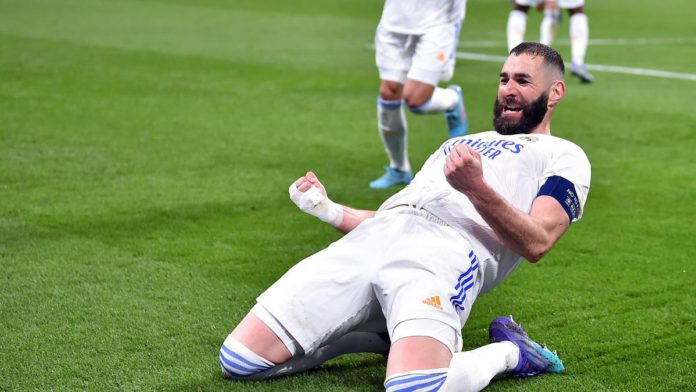 Karim Benzama of Real Madrid reacts after scoring during the UEFA Champions League Round Of Sixteen Leg Two match between Real Madrid and Paris Saint-Germain at Estadio Santiago Bernabeu on March 09, 2022 in Madrid, Spain. Image credit: Getty Images Karim Benzama of Real Madrid reacts after scoring during the UEFA Champions League Round Of Sixteen Leg Two match between Real Madrid and Paris Saint-Germain at Estadio Santiago Bernabeu on March 09, 2022 in Madrid, Spain. Image credit: Getty Images