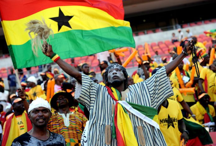 A Ghanian supporter cheers on January 20, 2013 before the start of a 2013 Africa Cup of Nations football match between Ghana and the Democratic Republic of Congo at the Nelson Mandela Bay Stadium in Port Elizabeth. AFP PHOTO / STEPHANE DE SAKUTIN A Ghanian supporter cheers on January 20, 2013 before the start of a 2013 Africa Cup of Nations football match between Ghana and the Democratic Republic of Congo at the Nelson Mandela Bay Stadium in Port Elizabeth. AFP PHOTO / STEPHANE DE SAKUTIN
