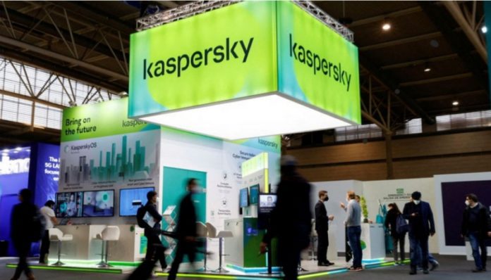 People walk next to Russian Kaspersky stand during the GSMA's 2022 Mobile World Congress (MWC), in Barcelona, Spain, March 2, 2022. REUTERS/ Albert Gea/File Photo People walk next to Russian Kaspersky stand during the GSMA's 2022 Mobile World Congress (MWC), in Barcelona, Spain, March 2, 2022. REUTERS/ Albert Gea/File Photo