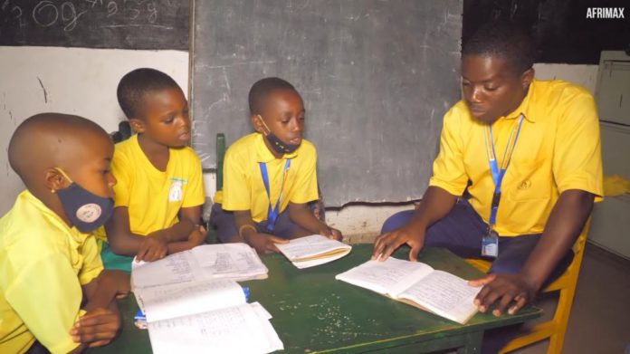 38-year-old man in the same class with his children