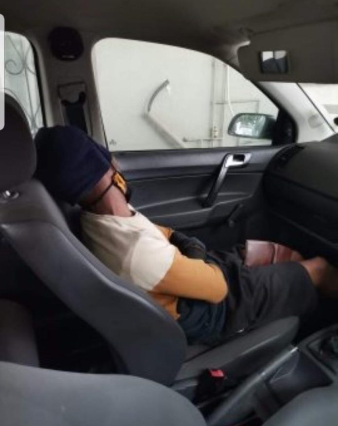 Robber arrested after falling asleep in car he broke into