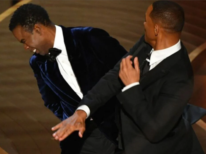 Will Smith slapped Chris Rock in the face on stage at the Oscars after the comic made a joke about the actor's wife Jada Pinkett Smith. Will Smith slapped Chris Rock in the face on stage at the Oscars after the comic made a joke about the actor's wife Jada Pinkett Smith.