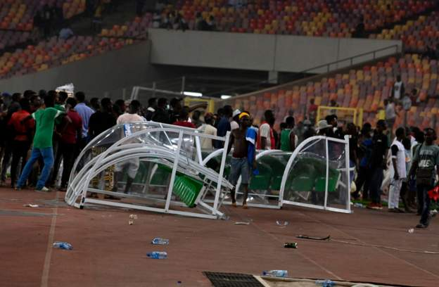 Super Eagles fans stormed the pitch after the game Super Eagles fans stormed the pitch after the game AFP