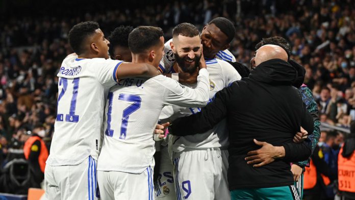 MADRID, SPAIN - APRIL 12: Karim Benzema of Real Madrid celebrates with teammates after scoring their team's second goal during the UEFA Champions League Quarter Final Leg Two match between Real Madrid and Chelsea FC at Estadio Santiago Bernabeu on April 1 Image credit: Getty Images MADRID, SPAIN - APRIL 12: Karim Benzema of Real Madrid celebrates with teammates after scoring their team's second goal during the UEFA Champions League Quarter Final Leg Two match between Real Madrid and Chelsea FC at Estadio Santiago Bernabeu on April 1 Image credit: Getty Images