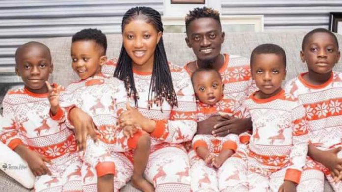 Photos of Lil Win, his wife, and five sons. Source: Lil Win