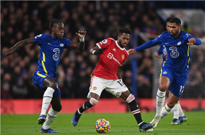 Manchester United's Fred (C) in action against Chelsea players Trevoh Chalobah (L) and Ruben Loftus-Cheek (R) Manchester United's Fred (C) in action against Chelsea players Trevoh Chalobah (L) and Ruben Loftus-Cheek (R)