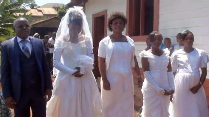 Pastor Zagabe with his four brides