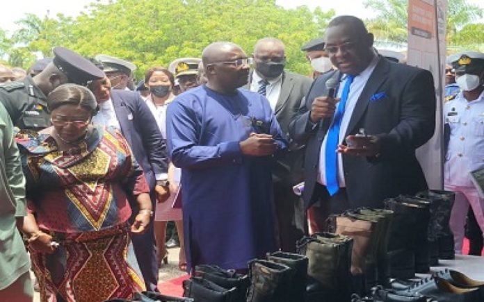 bAWUMIA AT SHOE FACTORY
