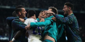 MADRID, SPAIN - MAY 04: Vinicius Junior of Real Madrid celebrates with team mates after Rodrygo of Real Madrid (not pictured) scores their sides second goal during the UEFA Champions League Semi Final Leg Two match between Real Madrid and Manchester City Image credit: Getty Images