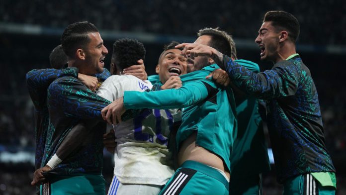 MADRID, SPAIN - MAY 04: Vinicius Junior of Real Madrid celebrates with team mates after Rodrygo of Real Madrid (not pictured) scores their sides second goal during the UEFA Champions League Semi Final Leg Two match between Real Madrid and Manchester City Image credit: Getty Images MADRID, SPAIN - MAY 04: Vinicius Junior of Real Madrid celebrates with team mates after Rodrygo of Real Madrid (not pictured) scores their sides second goal during the UEFA Champions League Semi Final Leg Two match between Real Madrid and Manchester City Image credit: Getty Images