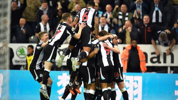 Callum Wilson is mobbed by teammates after Ben White's own goal hands Newcastle the lead over Arsenal Image credit: Getty Images Callum Wilson is mobbed by teammates after Ben White's own goal hands Newcastle the lead over Arsenal Image credit: Getty Images