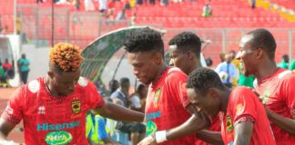 Etouga celebrates with Asante Kotoko teammates