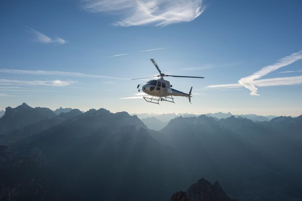 0_Helicopter-on-scenic-flight-at-sunrise-Alleghe-Dolomites-Italy The air force has been involved in the search for the helicopter (Image: Getty Images/Image Source)