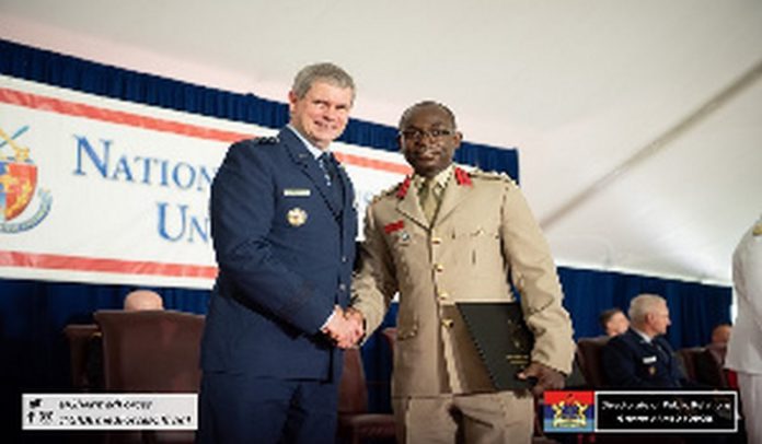 Gen Michael T Plehn, President of NDU in a handshake with Col Isaac Amponsah Source: Ghana Armed Forces Gen Michael T Plehn, President of NDU in a handshake with Col Isaac Amponsah Source: Ghana Armed Forces