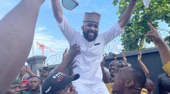 Olubankole Wellington (Banky W), lifted up by a jubilating crowd Credit: PremiumTimesNigeria website
