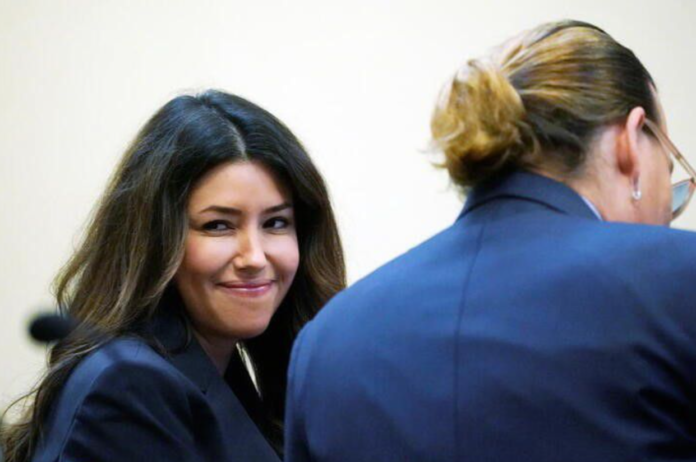 Attorney Camille Vasquez and actor Johnny Depp listen during actor's defamation case against ex-wife, actor Amber Heard, in the courtroom at the Fairfax County Circuit Courthouse in Fairfax, U.S., May 23, 2022. Steve Helber/Pool via REUTERS Attorney Camille Vasquez and actor Johnny Depp listen during actor's defamation case against ex-wife, actor Amber Heard, in the courtroom at the Fairfax County Circuit Courthouse in Fairfax, U.S., May 23, 2022. Steve Helber/Pool via REUTERS