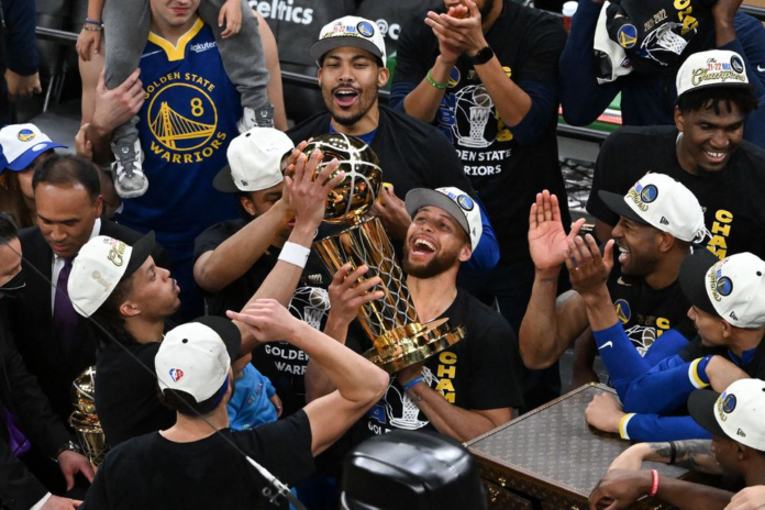 Jun 16, 2022; Boston, Massachusetts, USA; Golden State Warriors guard Stephen Curry (30) holds up the Larry O'Brien Trophy after defeating the Boston Celtics in game six of the 2022 NBA Finals at TD Garden. Mandatory Credit: Bob DeChiara-USA TODAY Sports/ Image Credit: REUTERS Jun 16, 2022; Boston, Massachusetts, USA; Golden State Warriors guard Stephen Curry (30) holds up the Larry O'Brien Trophy after defeating the Boston Celtics in game six of the 2022 NBA Finals at TD Garden. Mandatory Credit: Bob DeChiara-USA TODAY Sports/ Image Credit: REUTERS