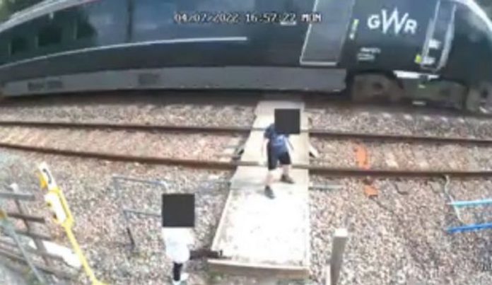 As the 125mph train approached, the two children were seen dancing and playing on the line source: mirroruk As the 125mph train approached, the two children were seen dancing and playing on the line source: mirroruk