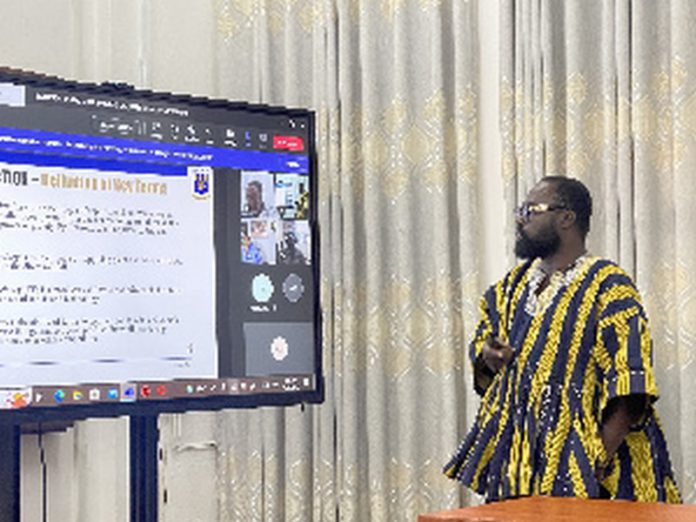 Otokunor during the defense of his thesis Otokunor during the defense of his thesis