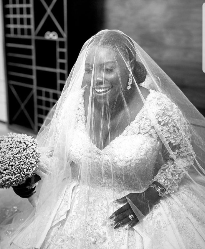 Singer Teni dazzles in luxurious wedding gown