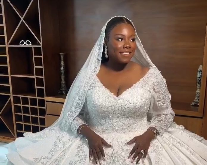 Singer Teni dazzles in luxurious wedding gown