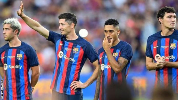 New signings Robert Lewandowski (second left) and Raphinha (second right) are yet to be registered for La Liga New signings Robert Lewandowski (second left) and Raphinha (second right) are yet to be registered for La Liga