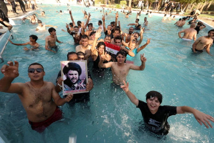 Iraq: Protesters swim in luxury pool after storming palace in deadly clashes