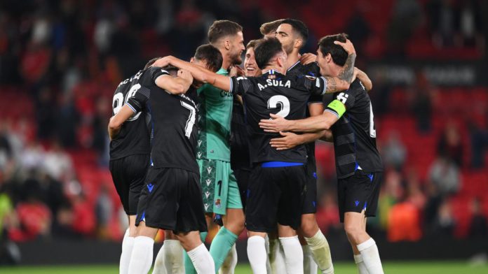 Real Sociedad players celebrate victory after the final whistle in the UEFA Europa League group E match between Manchester United and Real Sociedad at Old Trafford Image credit: Getty Images Real Sociedad players celebrate victory after the final whistle in the UEFA Europa League group E match between Manchester United and Real Sociedad at Old Trafford Image credit: Getty Images