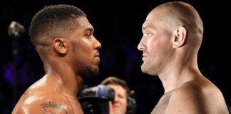 MANCHESTER, ENGLAND - DECEMBER 10: Wladimir Klitschko of Ukraine looks at Anthony Joshua of England (L) following the announcement that the pair will fight at Wembley Stadium in April 2017, at Manchester Arena on December 10, 2016 in Manchester, England. (Photo by Richard Heathcote/Getty Images)