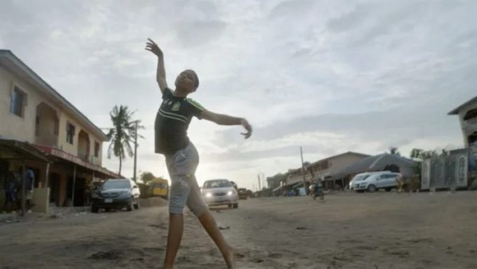 Anthony Madu dancing in the streets of Ajangbadi, Nigeria Disney/Motheo Moeng Anthony Madu dancing in the streets of Ajangbadi, Nigeria Disney/Motheo Moeng