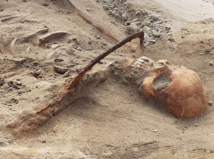 Female "vampire" with a sickle across her throat found in Pień, Poland Female "vampire" with a sickle across her throat found in Pień, Poland
