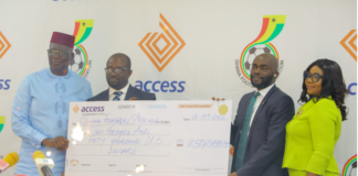 GFA boss Kurt Okraku [L] and Access Bank official [R]