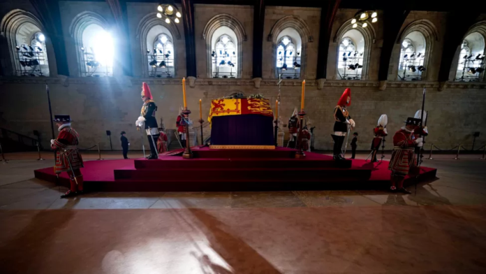 Thousands of people have been queuing along the banks of the River Thames to view the Queen's coffin as she lies in state in London's Westminster Hall. | credit: Getty Images