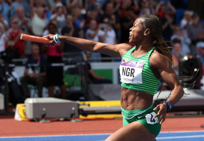 Commonwealth Games - Athletics - Women's 4 x 100m Relay - Final - Alexander Stadium, Birmingham, Britain - August 7, 2022 Nigeria's Nzubechi Grace Nwokocha celebrates after winning gold REUTERS/Phil Noble