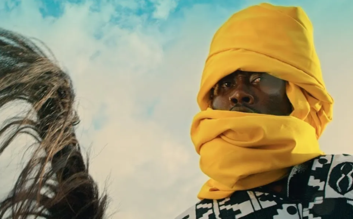 Kirani Ayat in his Guda music video Kirani Ayat in his Guda music video