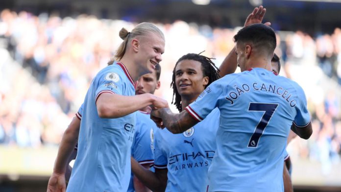 Erling Haaland celebrates with Joao Cancelo and Nathan Ake of Manchester City after scoring their team's fourth goal during the Premier League match between Manchester City and Southampton FC at Etihad Stadium on October 08, 2022 in Manchester, England. Image credit: Getty Images Erling Haaland celebrates with Joao Cancelo and Nathan Ake of Manchester City after scoring their team's fourth goal during the Premier League match between Manchester City and Southampton FC at Etihad Stadium on October 08, 2022 in Manchester, England. Image credit: Getty Images