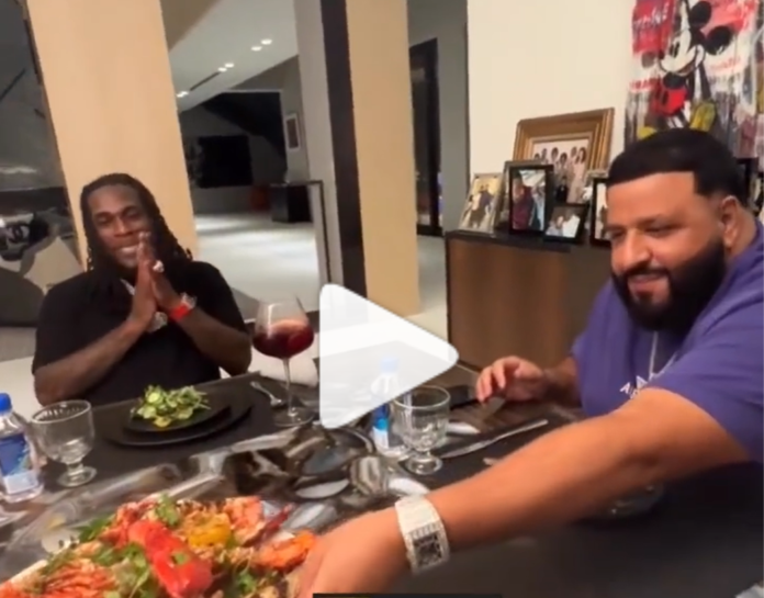 Burna Boy dines with DJ Khaled as they record a song together Burna Boy dines with DJ Khaled as they record a song together