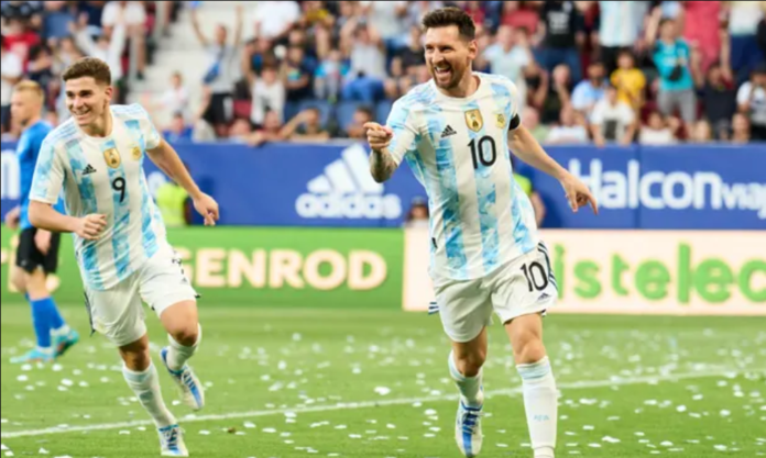 Lionel Messi (right) celebrates after scoring his and Argentina’s third goal against Estonia in Pamplona, Spain. Photograph: Juan Manuel Serrano Arce/Getty Images