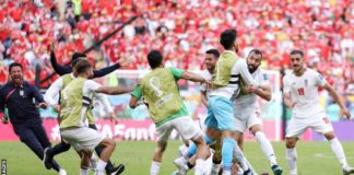 Iran celebrate Rouzbeh Cheshmi's goal
