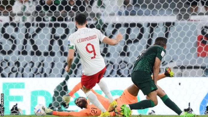 Robert Lewandowski scored his first World Cup goal after robbing Abdelulelah Al Malki of possession Robert Lewandowski scored his first World Cup goal after robbing Abdelulelah Al Malki of possession