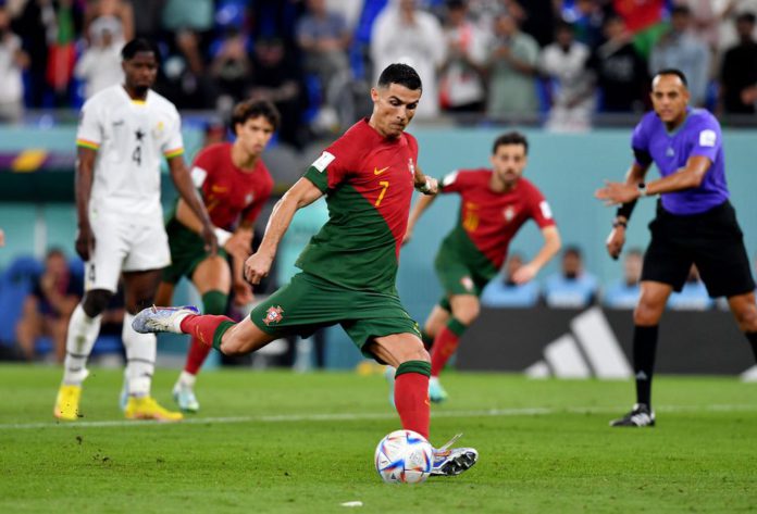 FIFA World Cup Qatar 2022 - Group H - Portugal v Ghana - Stadium 974, Doha, Qatar - November 24, 2022 Portugal's Cristiano Ronaldo scores their first goal from the penalty spot REUTERS/Jennifer Lorenzini FIFA World Cup Qatar 2022 - Group H - Portugal v Ghana - Stadium 974, Doha, Qatar - November 24, 2022 Portugal's Cristiano Ronaldo scores their first goal from the penalty spot REUTERS/Jennifer Lorenzini