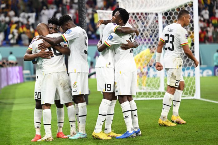 Ghana's midfielder #10 Andre Ayew (L) celebrates with teammates after scoring his team's first goal during the Qatar 2022 World Cup Group H football match between Portugal and Ghana at Stadium 974 in Doha on November 24, 2022. (Photo by MANAN VATSYAYANA / AFP) (Photo by MANAN VATSYAYANA/AFP via Getty Images) FIFA World Cup Ghana's midfielder #10 Andre Ayew (L) celebrates with teammates after scoring his team's first goal during the Qatar 2022 World Cup Group H football match between Portugal and Ghana at Stadium 974 in Doha on November 24, 2022. (Photo by MANAN VATSYAYANA / AFP) (Photo by MANAN VATSYAYANA/AFP via Getty Images) FIFA World Cup